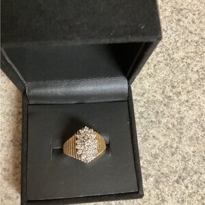 14kt gold Diamond ring.